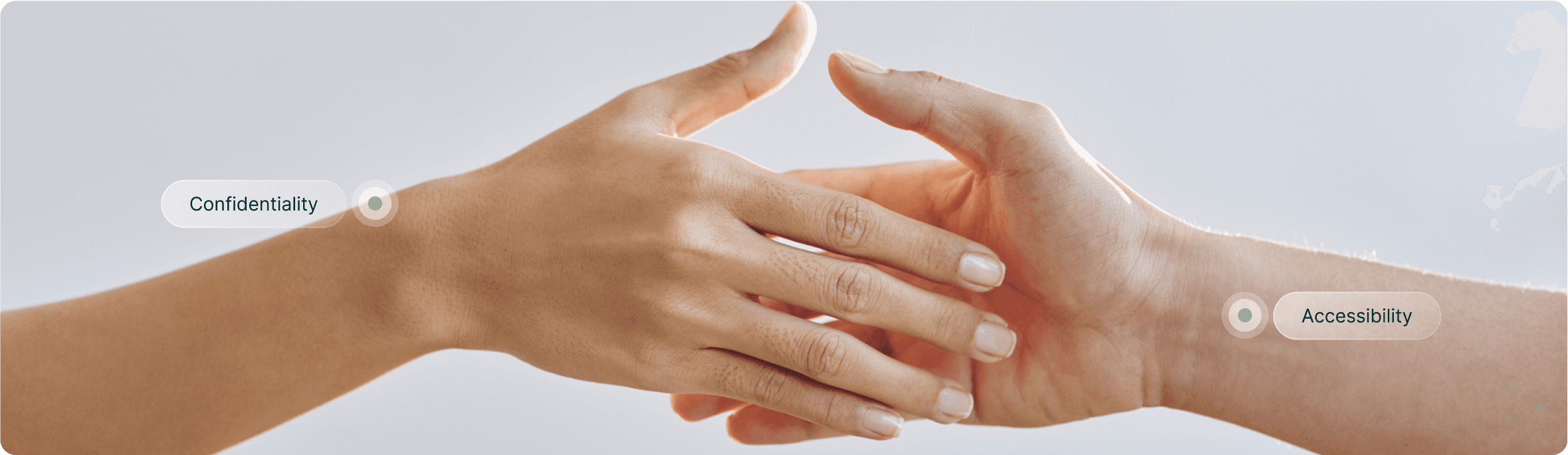 Hands reaching towards each other representing wellness and care